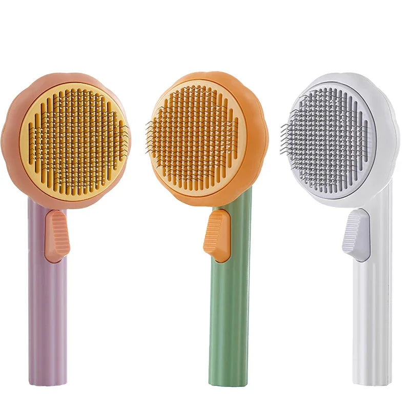 Three handheld grooming tools with different brush designs on a white background